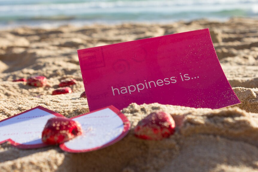 Happiness inspiration card on Manly Beach