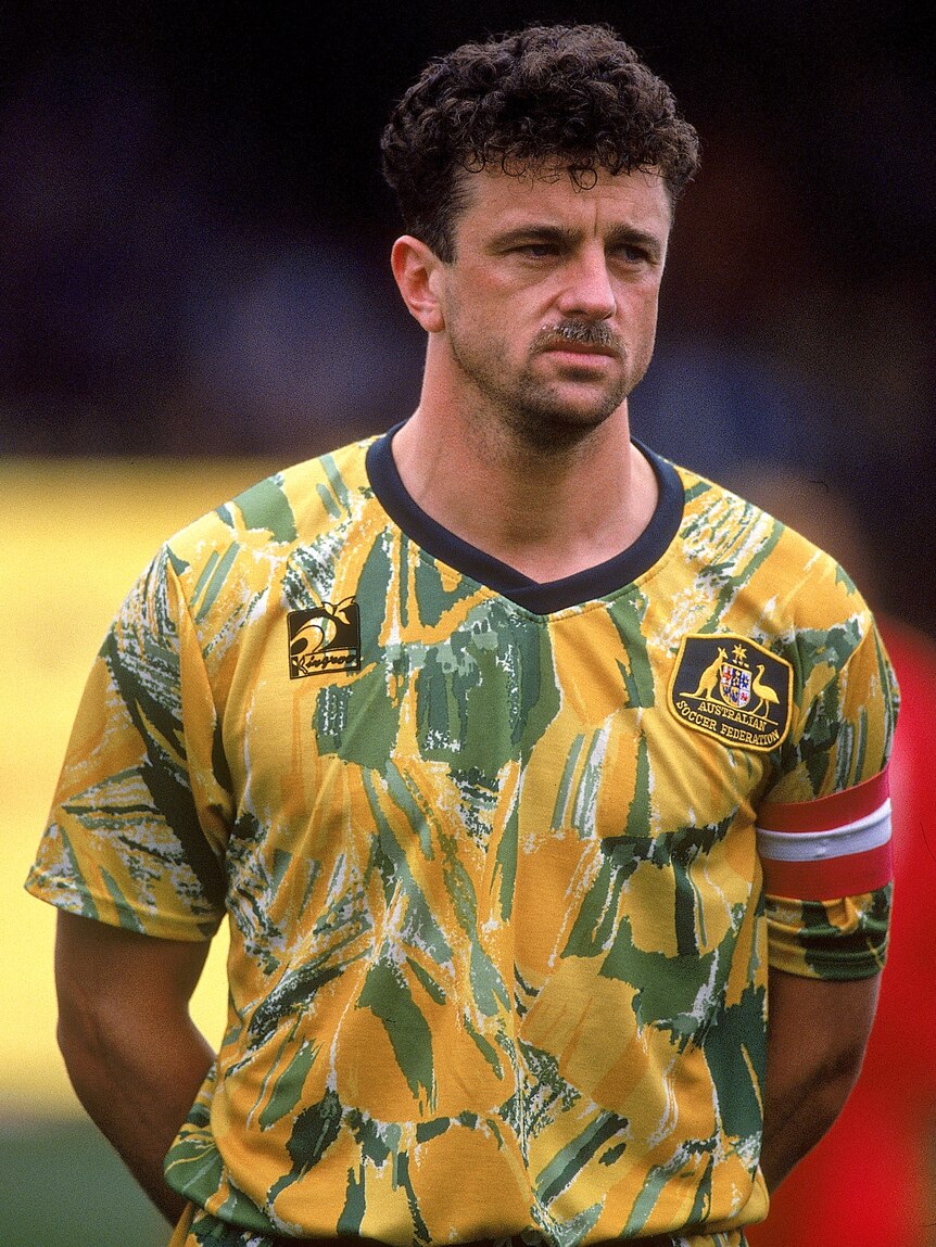 A young man with a moustache in Socceroos gear from 1993.