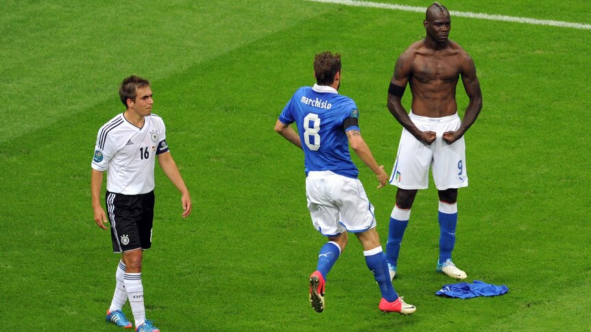 A shirtless Mario Balotelli celebrates scoring during the Italy v Germany Euro 2012 semi-final.