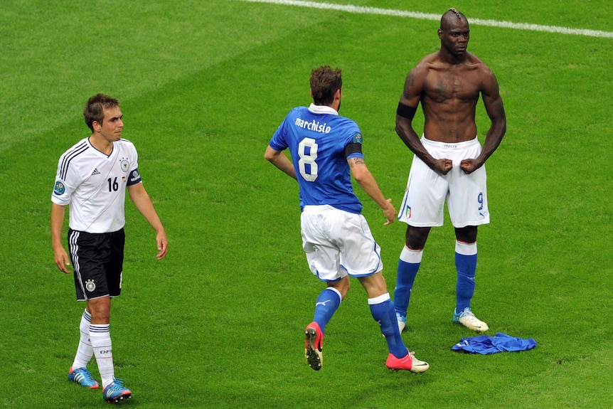 A shirtless Mario Balotelli celebrates scoring during the Italy v Germany Euro 2012 semi-final.