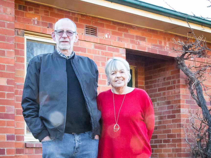 Canberra couple June and Jeff Dreece of Narrabundah in their front yard