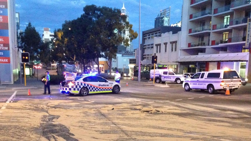 Sand strewn across Wellington Street after water main burst