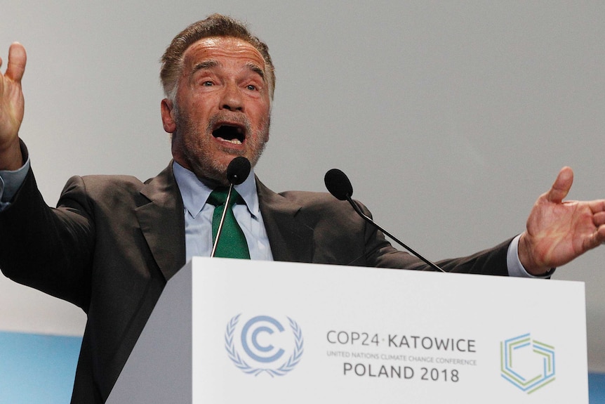 Actor Arnold Schwarzenegger delivers a speech during the opening of COP24 UN Climate Change Conference 2018