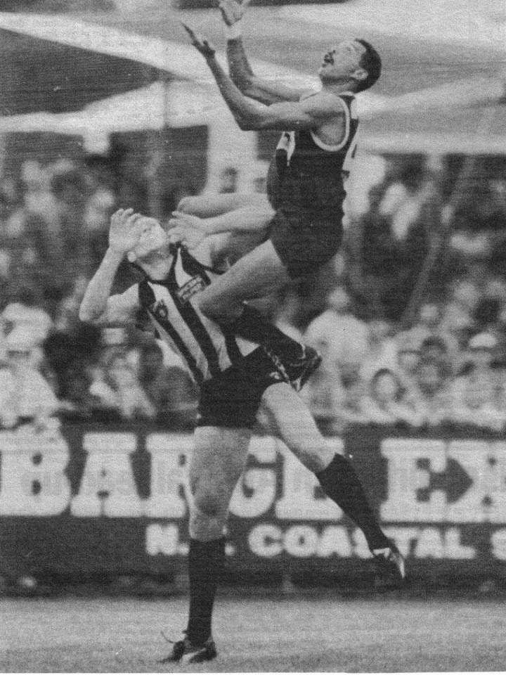 Dennis Dunn flies for a spectacular mark against Collingwood for the Aboriginal All-Stars in 1994.