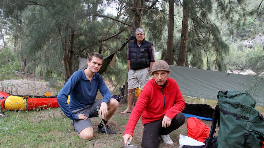 Three environmental activists, Harry Burkitt, Jeff Cottrell and Gary Caganoff in  a riverside camp.