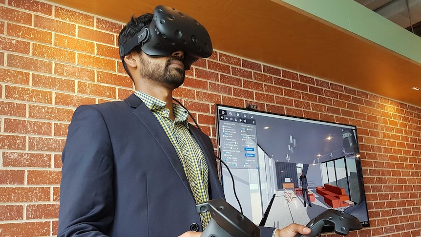 Ray Singh uses VR headset