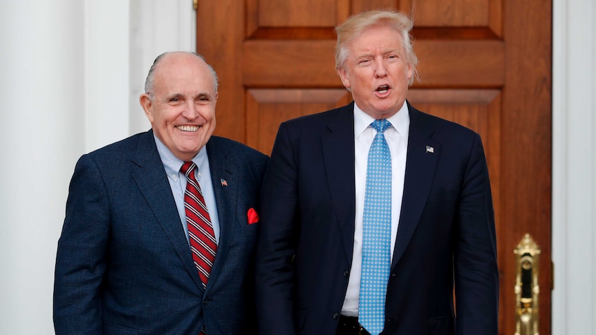 Donald Trump, right, stands next to Rudy Giuliani.