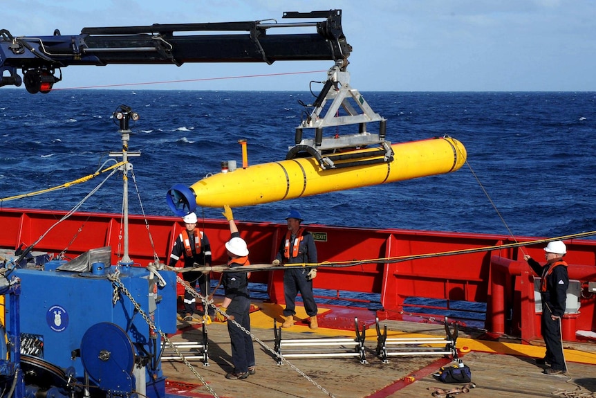 The Bluefin-21 is hoisted back on board the Australian Defence Vessel Ocean Shield.