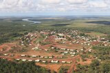 An aerial view of houses and buildings in the remote Aboriginal community of Wadeye in the NT.