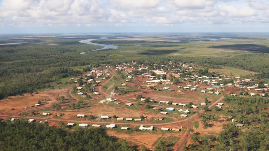 An aerial view of houses and buildings in the remote Aboriginal community of Wadeye in the NT.