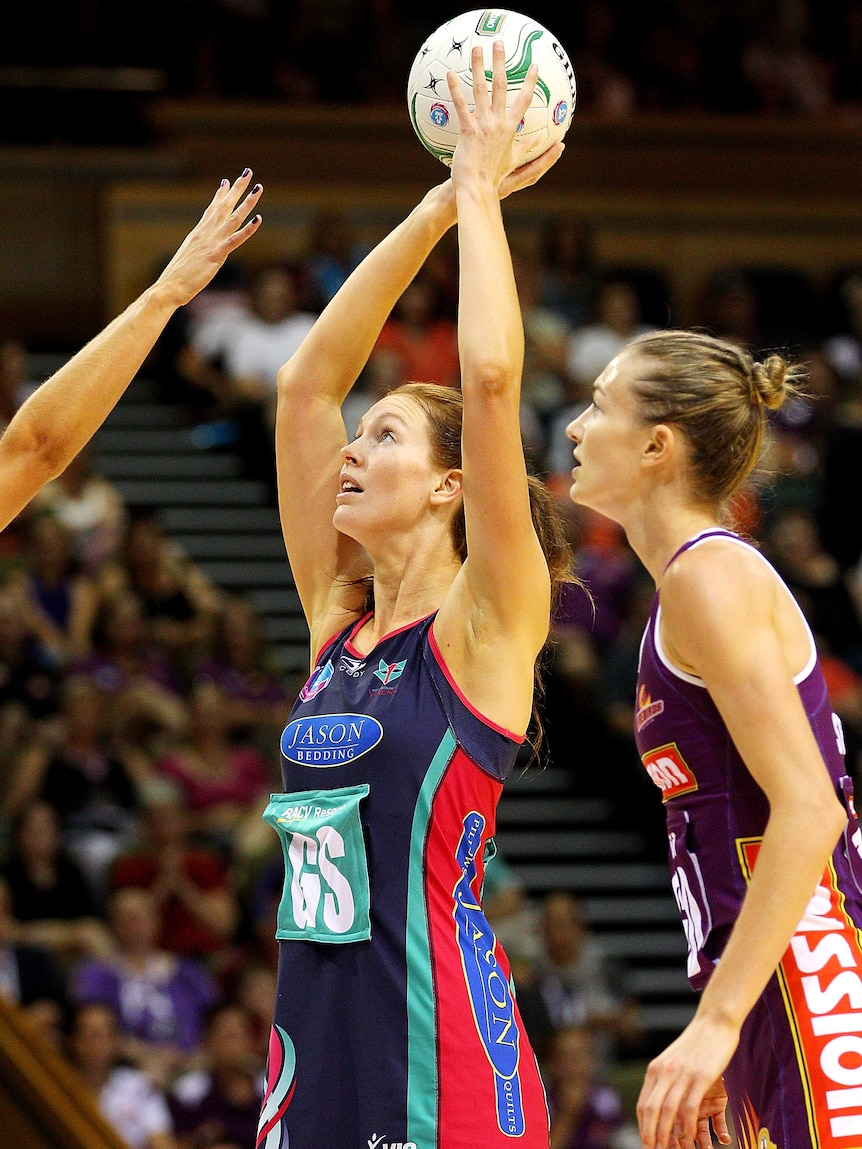 Extinguishing the Firebirds ... Kate Beverage takes a shot for the Vixens.
