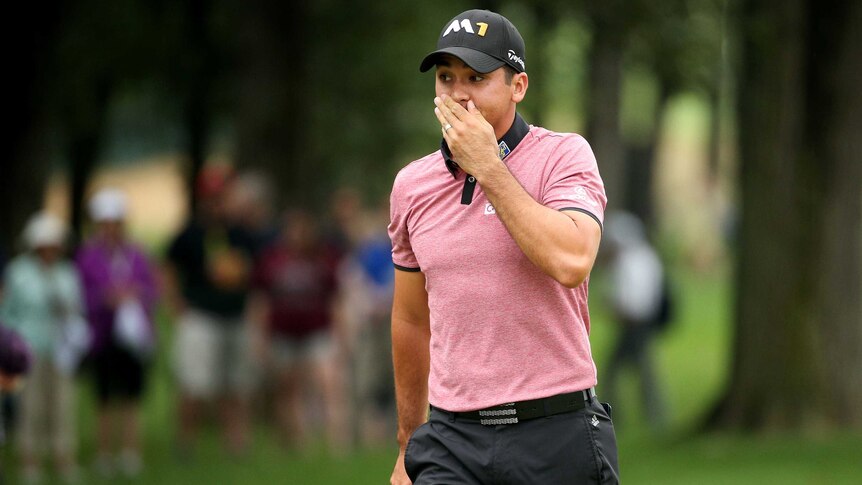 Jason Day reacts to shot in Illinois