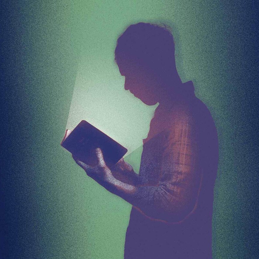 Illustration of a man staring into an illuminated book.