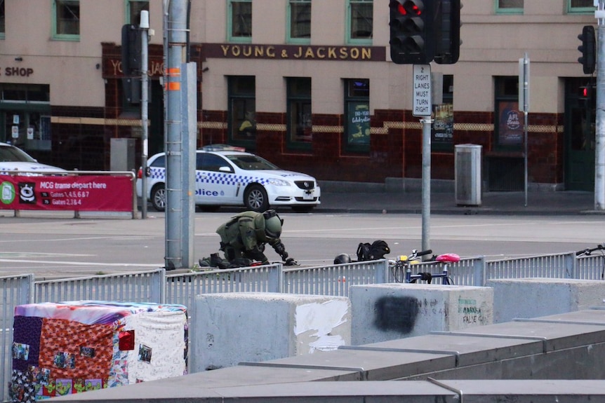 A police officer at the scene of the incident in Melbourne's CBD.