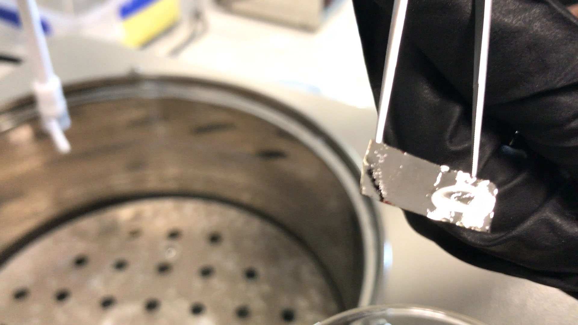 Metallic glass ribbon removes dye from water. - ABC News