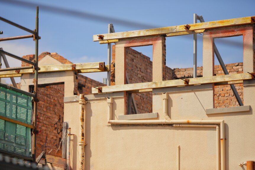 Exposed brick and scaffold at the Broadway Hotel.