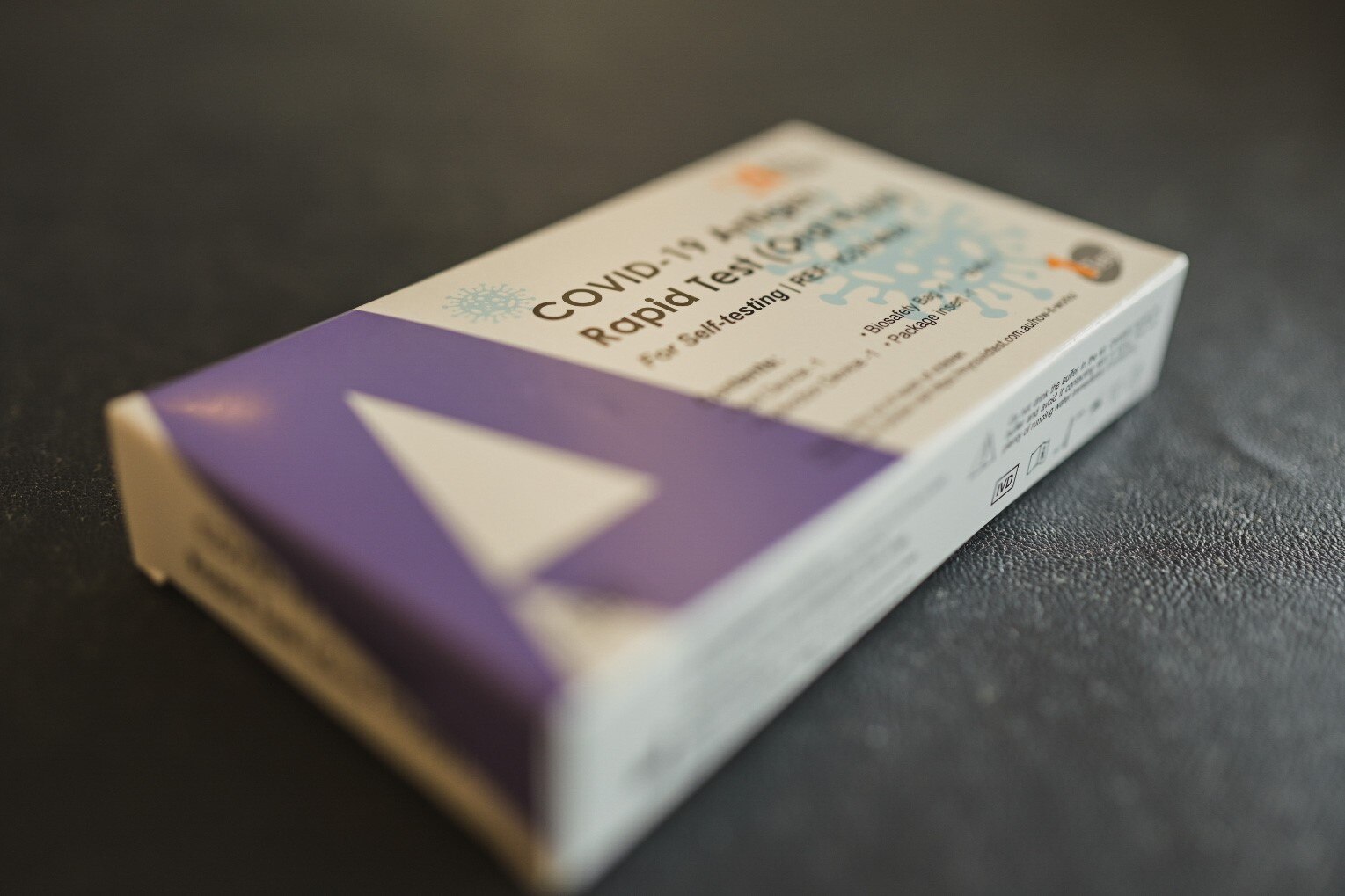 Close-up of a box containing an rapid antigen test (RAT) for COVID. 