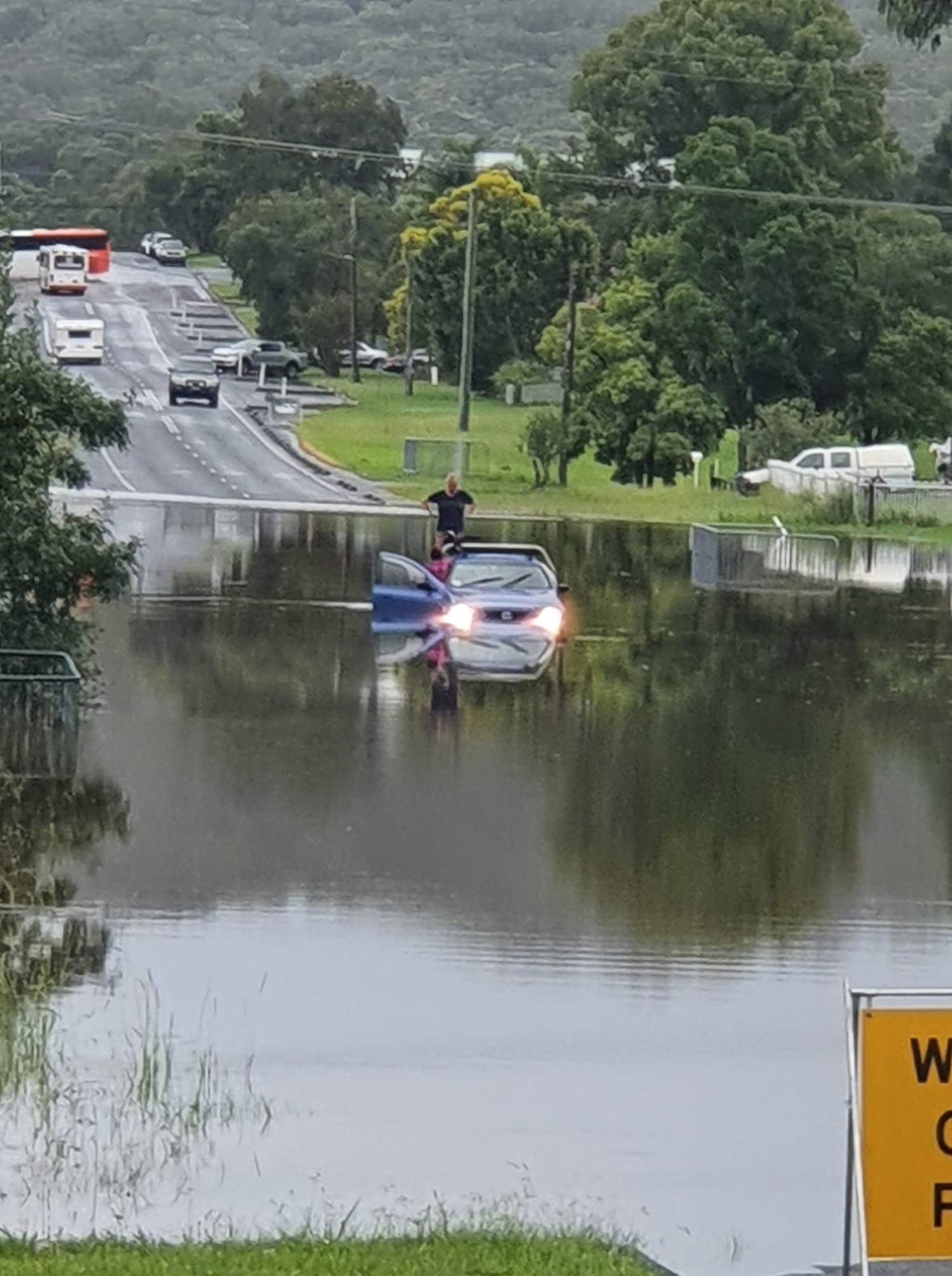 a car under water on a street