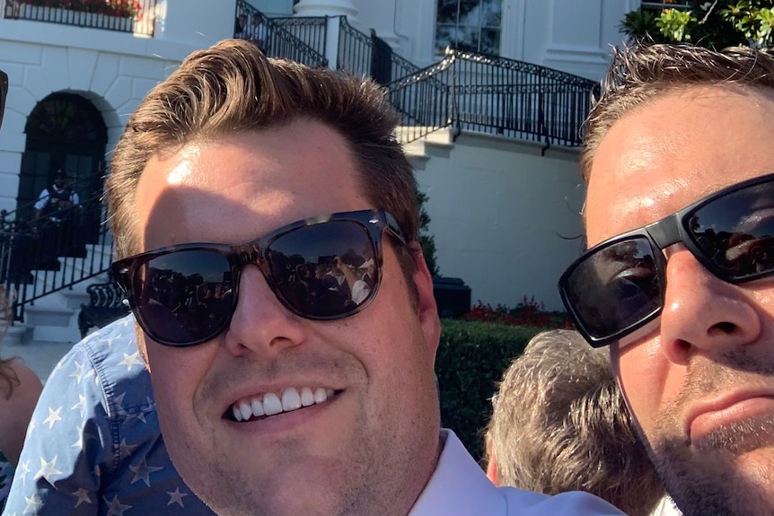 Matt Gaetz and Joel Greenberg pose for a selfie in sunglasses.