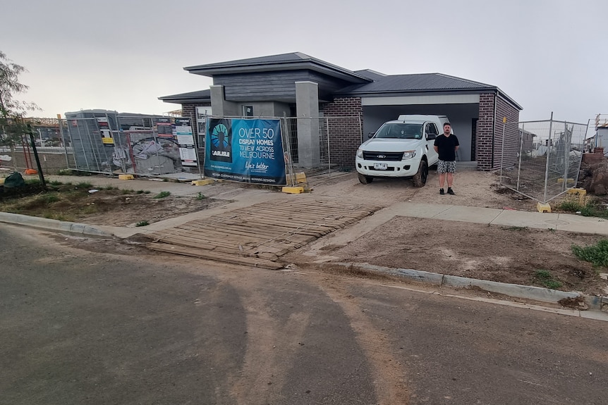 Jonathan outside his Lara home being built. 