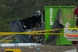 A picture showing the truck's load spilling out of the back.
