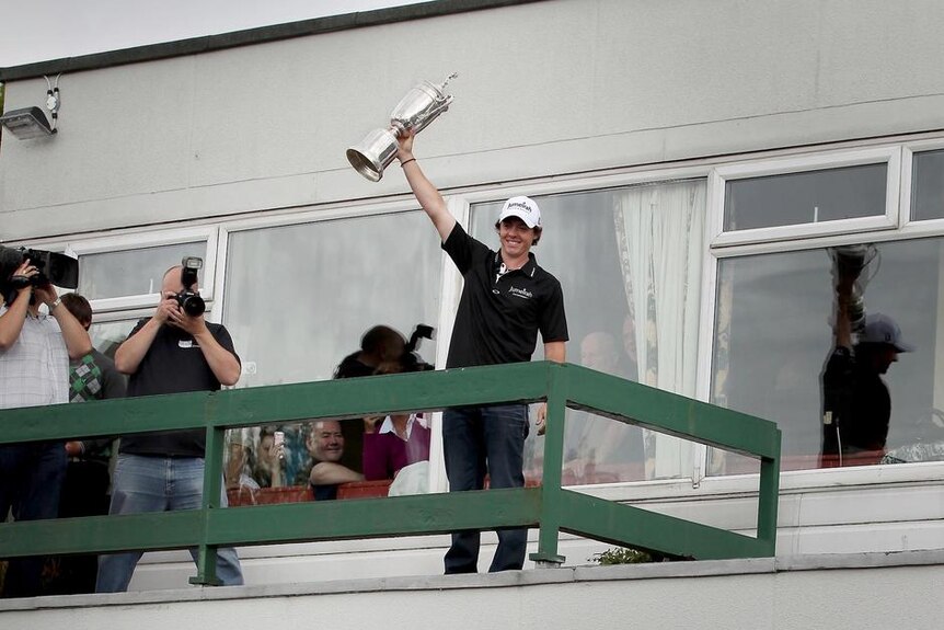 'With success comes expectation': US Open champion Rory McIlroy celebrates in Belfast.