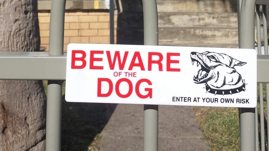 'Beware of the dog' sign outside the house where a child was bitten by two dogs at Bellambi, near Wollongong, July 9, 2014