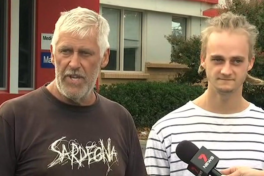 Trevor Salvado with his son at a press conference at Wangaratta Hospital.