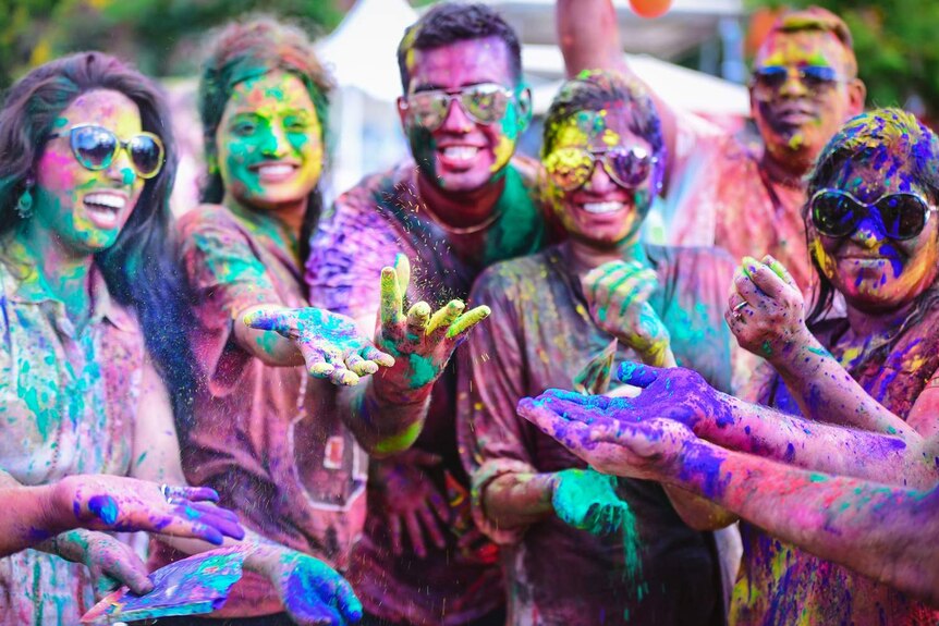 Group of people celebrate Holi Festival of Colour at Springfield's Robelle Domain on March 12, 2017.