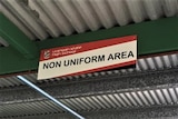 A sign saying "non uniform area".