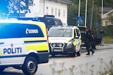 Police attend the scene after a shooting inside the al-Noor Islamic center mosque near Oslo.
