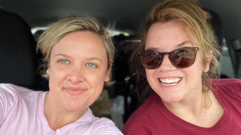 Melbourne mums Mel Currey and Hylton Shaw take a selfie in their car.