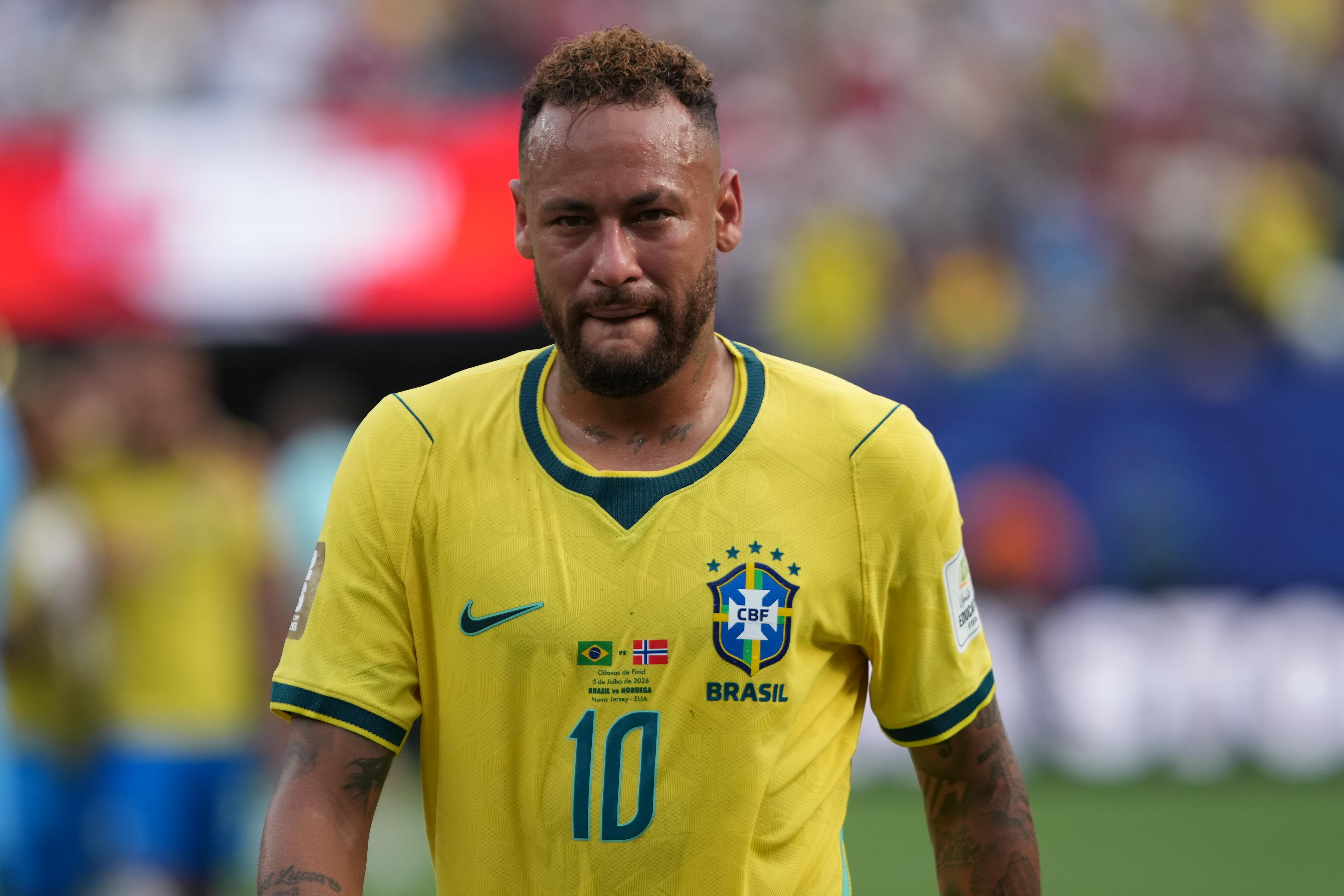 Brazil player Neymar walks off disappointed after a loss