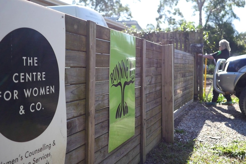 Signage on fence of house where Running Wild youth service is based on Macleay Island, off Brisbane.