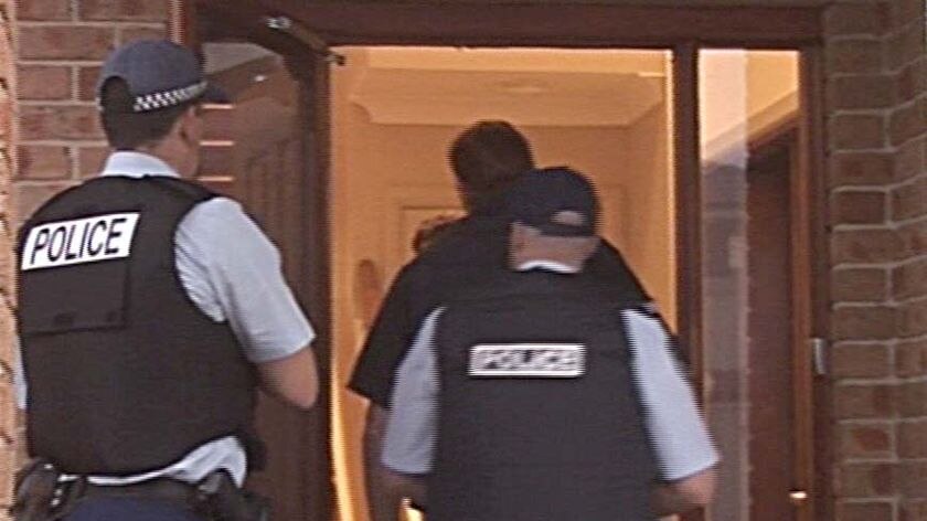 The two men and a woman were arrested in south-west Sydney this morning.