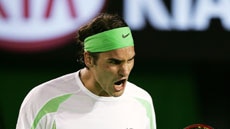 Roger Federer pumps himself up against Nikolay Davydenko