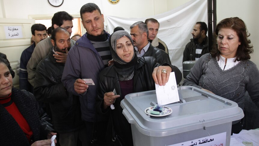 People vote in Syrian elections
