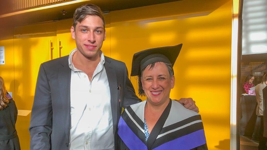 Joanna Olsen, 54, and son Albert after graduating with a law degree from the University of Technology Sydney