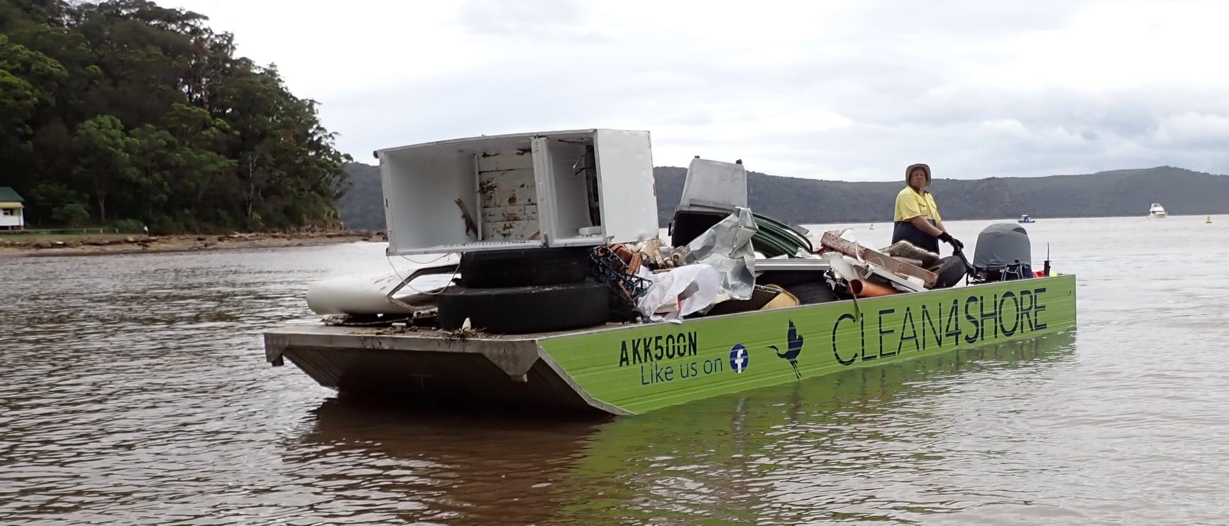 Clean4Shore trawled the waterways to collect tonnes of rubbish including a fridge after the 2022 floods. 