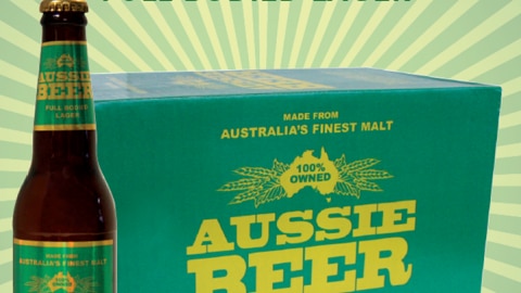 Green and gold label on beer bottle and beer carton says Aussie Beer with Australia's finest malt
