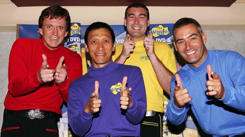 The Wiggles pose for a photograph before performing