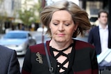A tight head shot of Perth Lord Mayor Lisa Scaffidi looking down walking along a street.