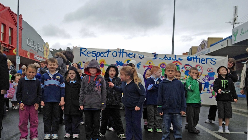 School children walk in New Norfolk, Tasmania, in a rally against bullying