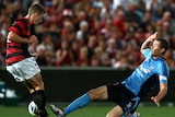 Red mist descends ... Sydney FC's Brett Emerton was sent off for this tackle on Shannon Cole.