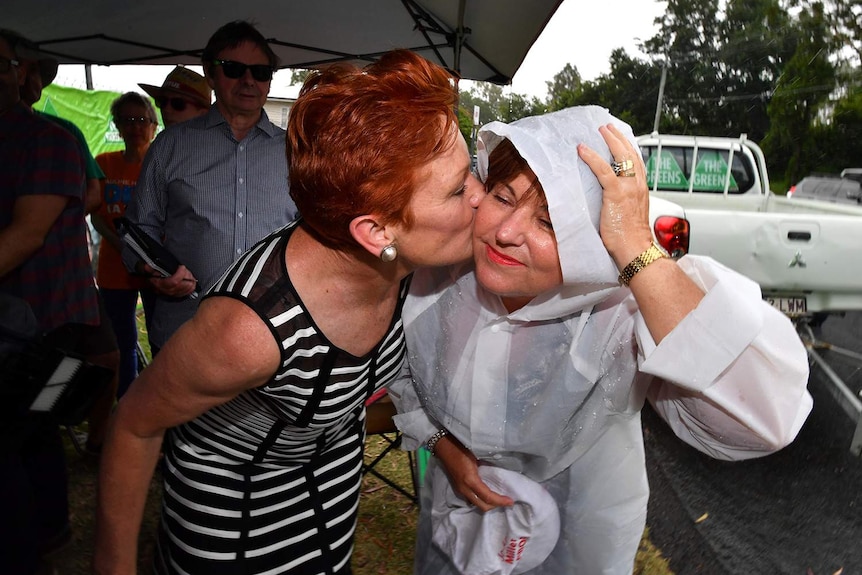 Pauline Hanson kisses Jo-Ann Miller while campaigning in Ipswich for the 2017 state election.