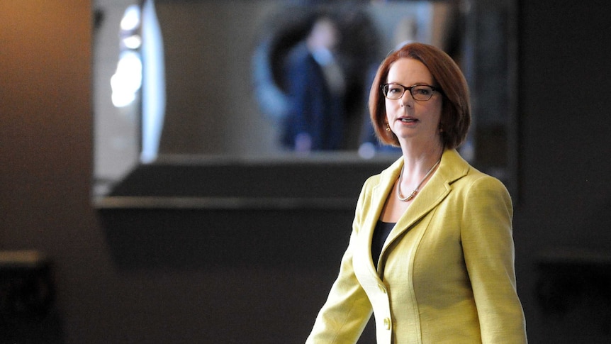 Prime Minister Julia Gillard arrives at a meeting of ALP candidates in Canberra. (AAP: Alan Porritt)