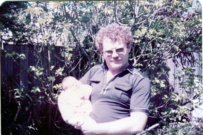 Elisha Rose as a baby with her father Lindsey Rose