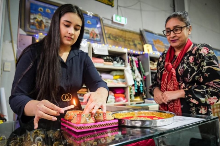 Two women working in a shop