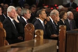 Political heavyweights wait at the funeral service of Senator Ted Kennedy