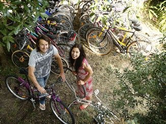 Stuart Allen and Kelly O'Brien with the bikes